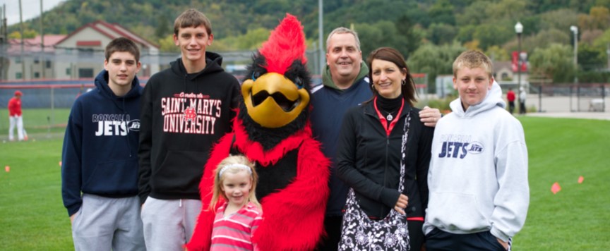 Family with Big Red mascot