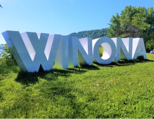Winona in large metal letters